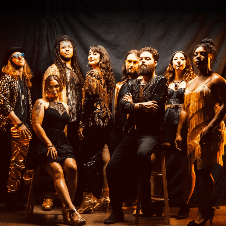 The Gold Souls dressed in gold and black.